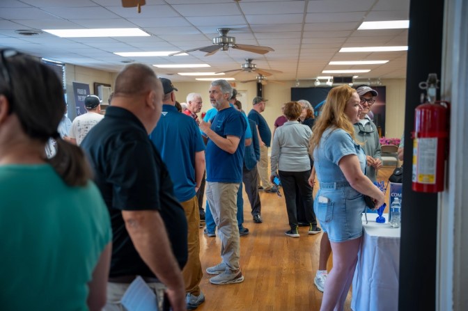 Group of people in community meeting photo