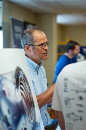 man speaking in meeting photo