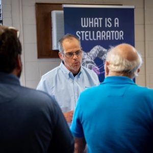 Man speaking at Type One Energy community meeting photo
