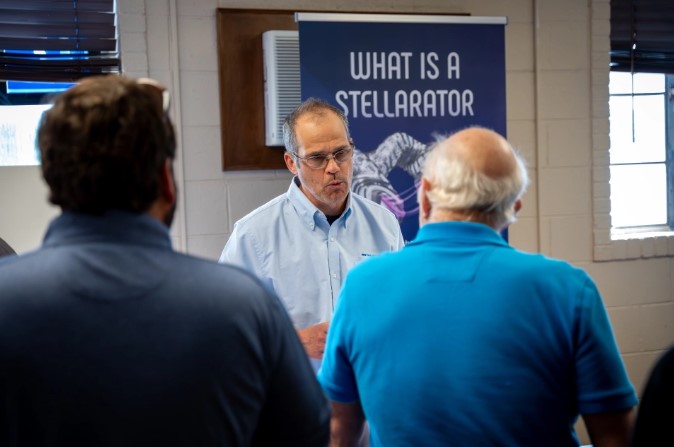 Man speaking at Type One Energy community meeting photo